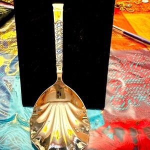 Kitchenware beauty of a shell shaped ladle-8" long. Hand made I Connecticut